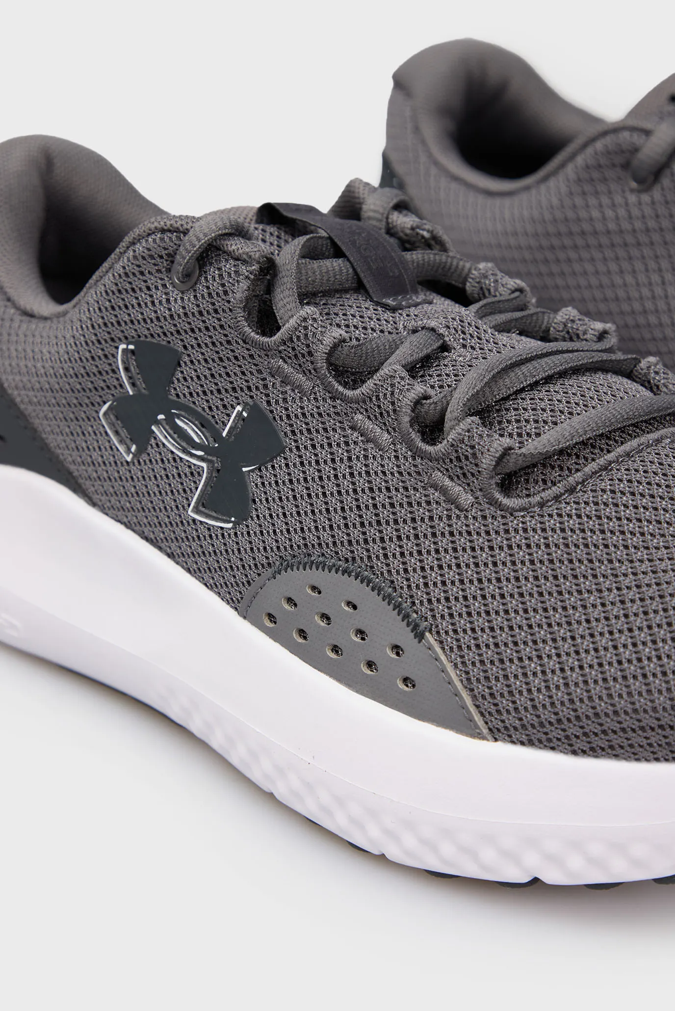 Krossovka/UA Charged Surge 4 2