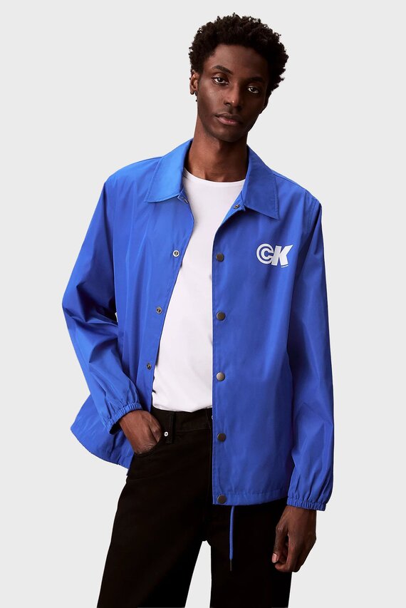 Yengil kurtka LS  NYLON CK GRAPHIC COACHES JAC Calvin Klein Jeans Yengil kurtka LS  NYLON CK GRAPHIC COACHES JAC Calvin Klein Jeans